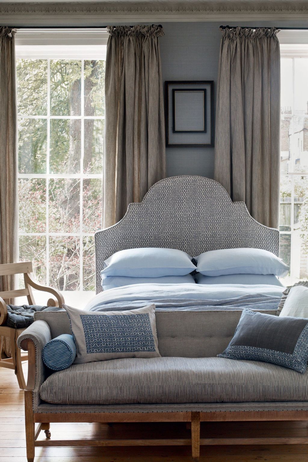 Image may contain Furniture Indoors Room Bedroom Bed Couch and Interior Design