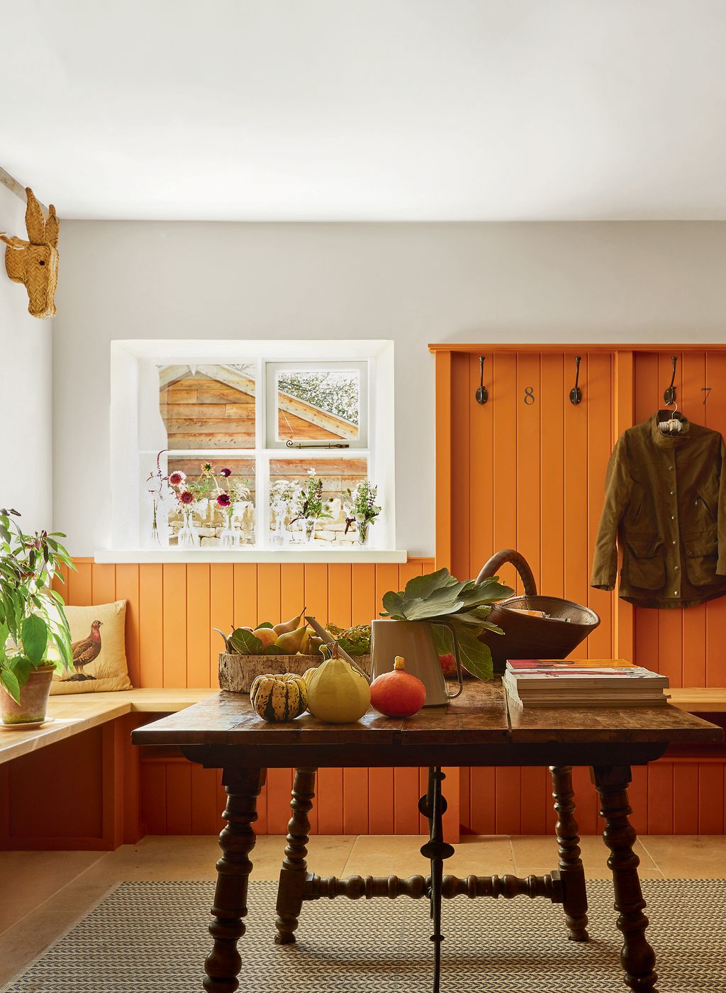 Image may contain Furniture Plant Room Indoors Table Tabletop Living Room and Wood