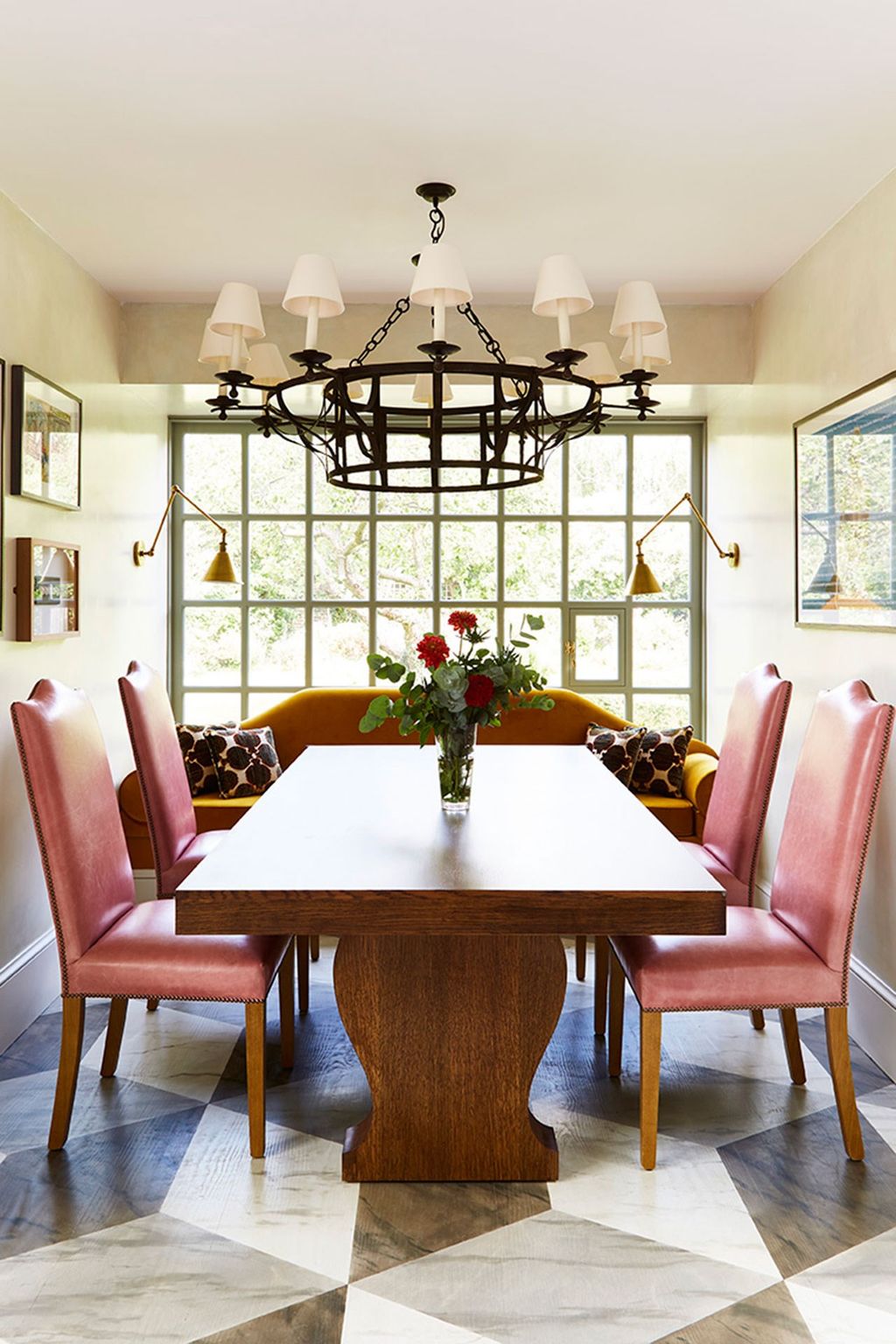 Image may contain Furniture Chair Dining Table Table Interior Design Indoors Flooring Wood Room Hardwood and Plant