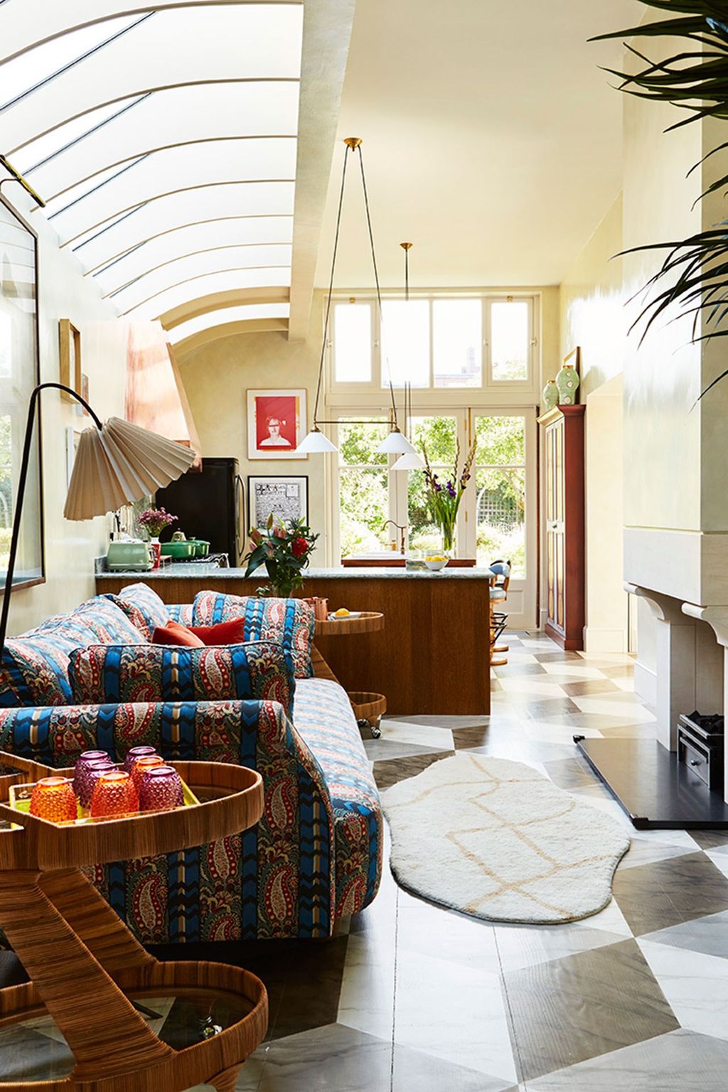 Image may contain Living Room Room Indoors Furniture Couch Interior Design Flooring Home Decor Rug and Housing