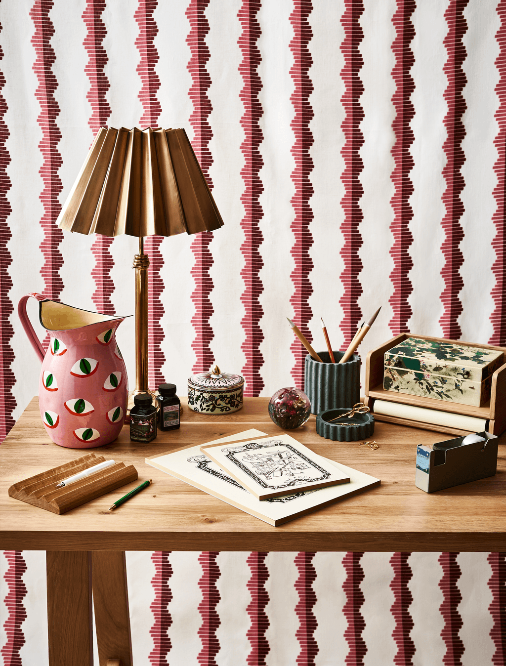 Image may contain Furniture Tabletop Table Rug Lamp Table Lamp and Desk