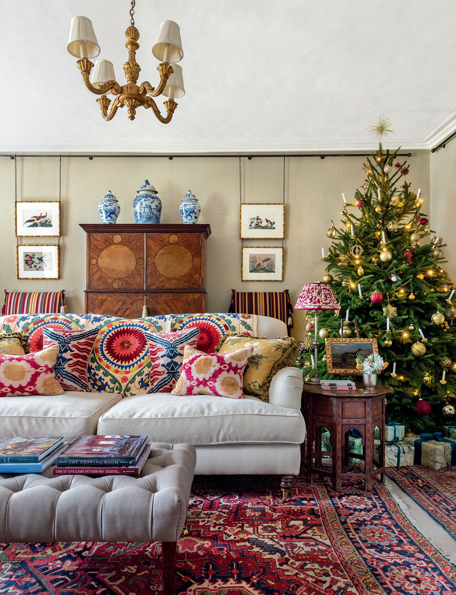 Image may contain Living Room Room Indoors Furniture Couch Tree Plant Rug Cushion Interior Design and Ornament