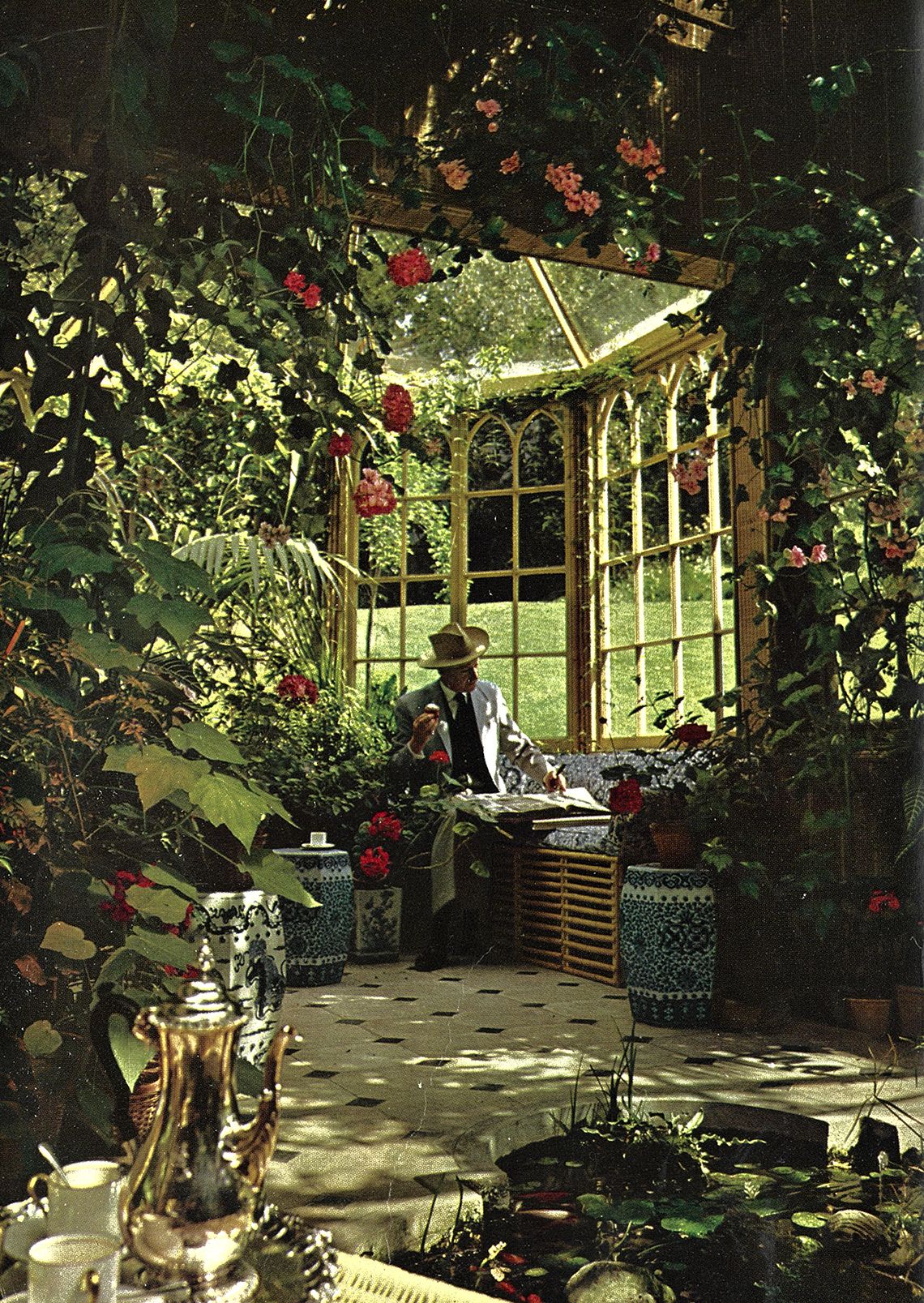 Image may contain Outdoors Garden Human Person Arbour Patio Porch Vase Plant Pottery Potted Plant and Jar