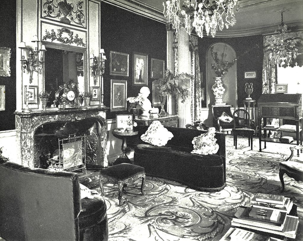 Image may contain Indoors Furniture Room Living Room Couch Human Person Waiting Room and Lamp