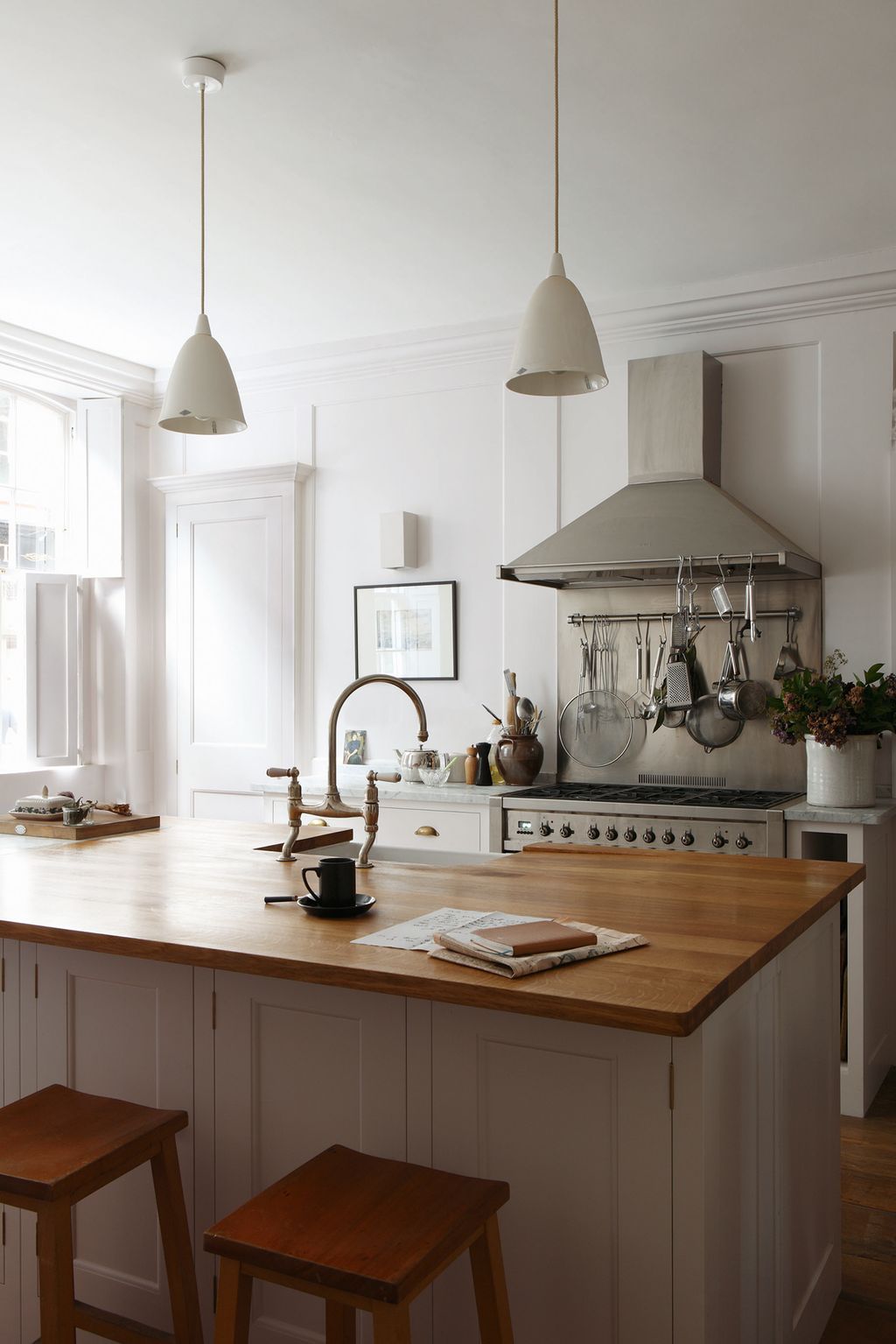 Image may contain Indoors Room Kitchen Kitchen Island and Sink Faucet