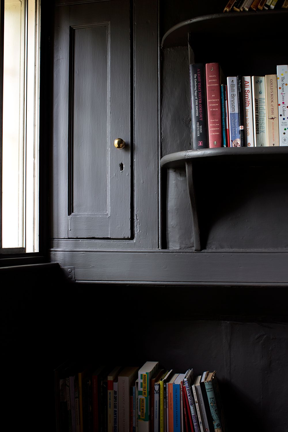 Image may contain Furniture Bookcase Shelf Cupboard and Closet