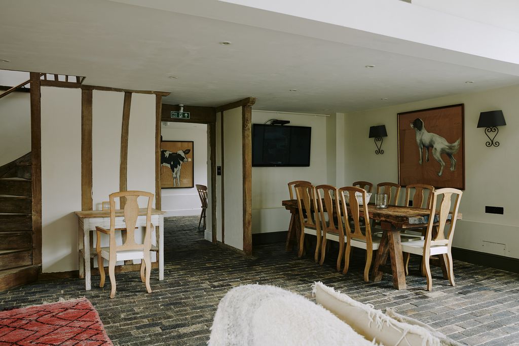 Image may contain Flooring Wood Hardwood Floor Furniture Chair Plywood Living Room Indoors Room and Dining Table