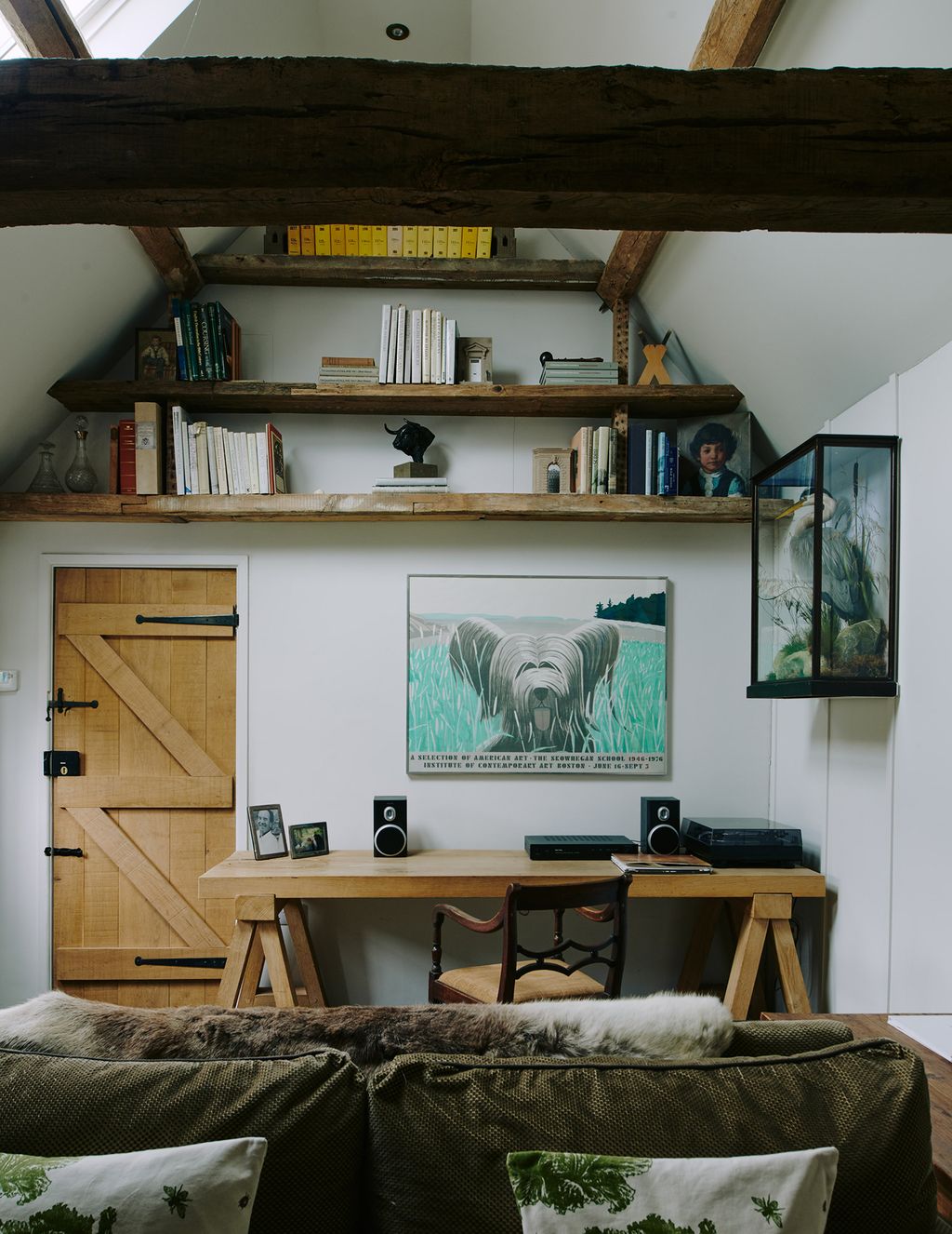 Image may contain Furniture Shelf Wood Living Room Indoors Room Interior Design Bedroom Human Person and Plywood