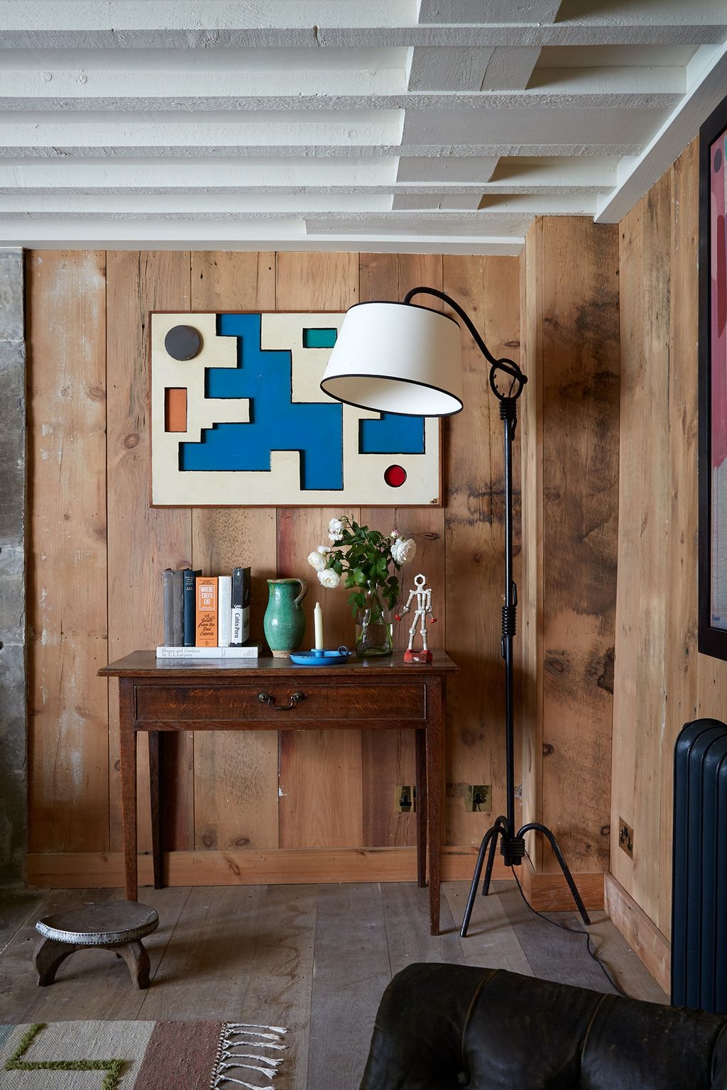 Image may contain Furniture Wood Tripod Interior Design Indoors Hardwood and Plywood