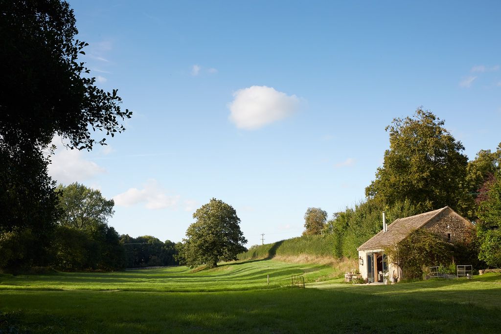 Image may contain Outdoors Field Nature Building and Housing