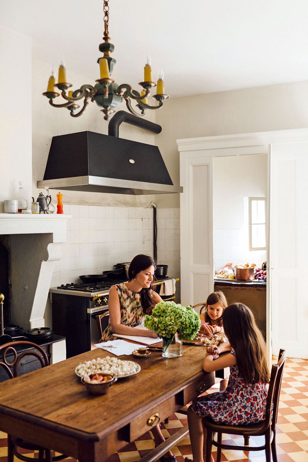 Image may contain Furniture Chair Human Person Indoors Room Dining Table Table and Restaurant