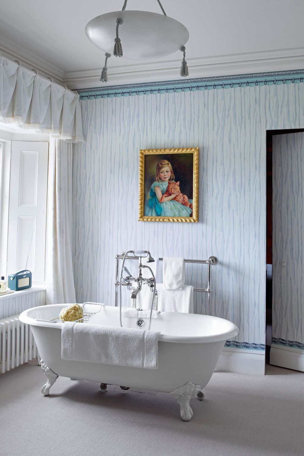 A light by Hector Finch hangs in the main bathroom of this 18th Century house.  Like this Then you'll love  Top tips for...