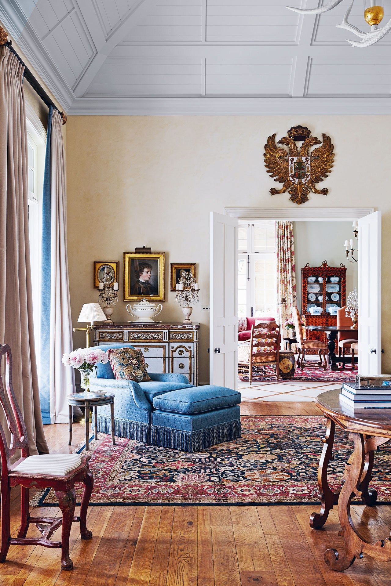 Image may contain Furniture Chair Living Room Indoors Room Rug and Table