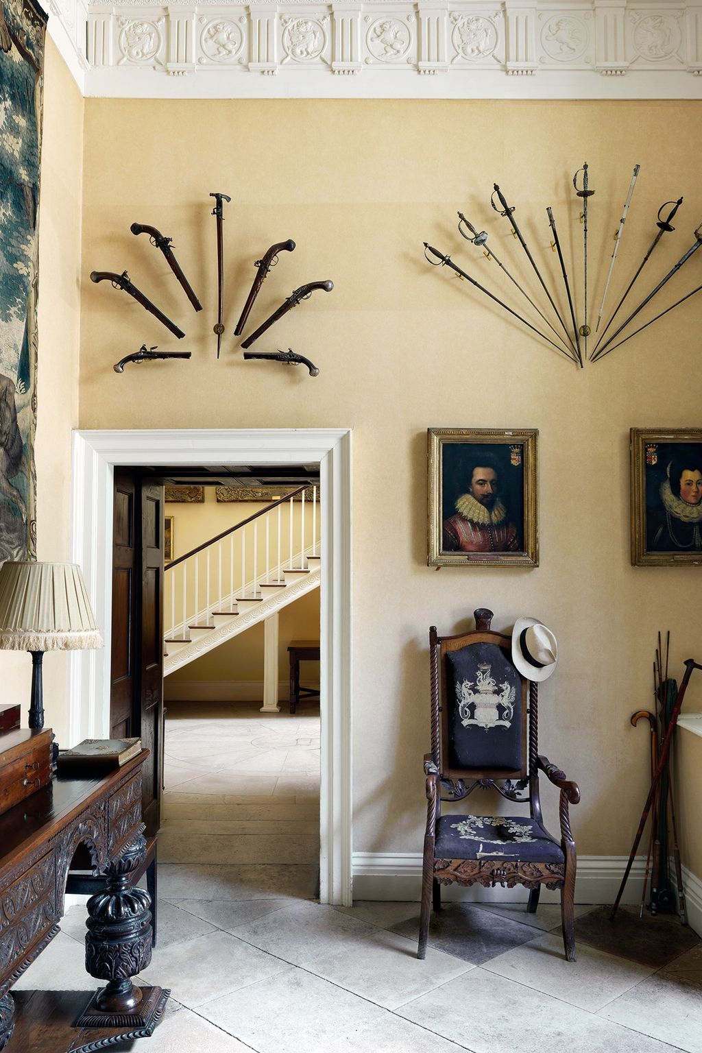 Image may contain Furniture Chair Wood Living Room Room Indoors Hardwood Interior Design Flooring Human and Person