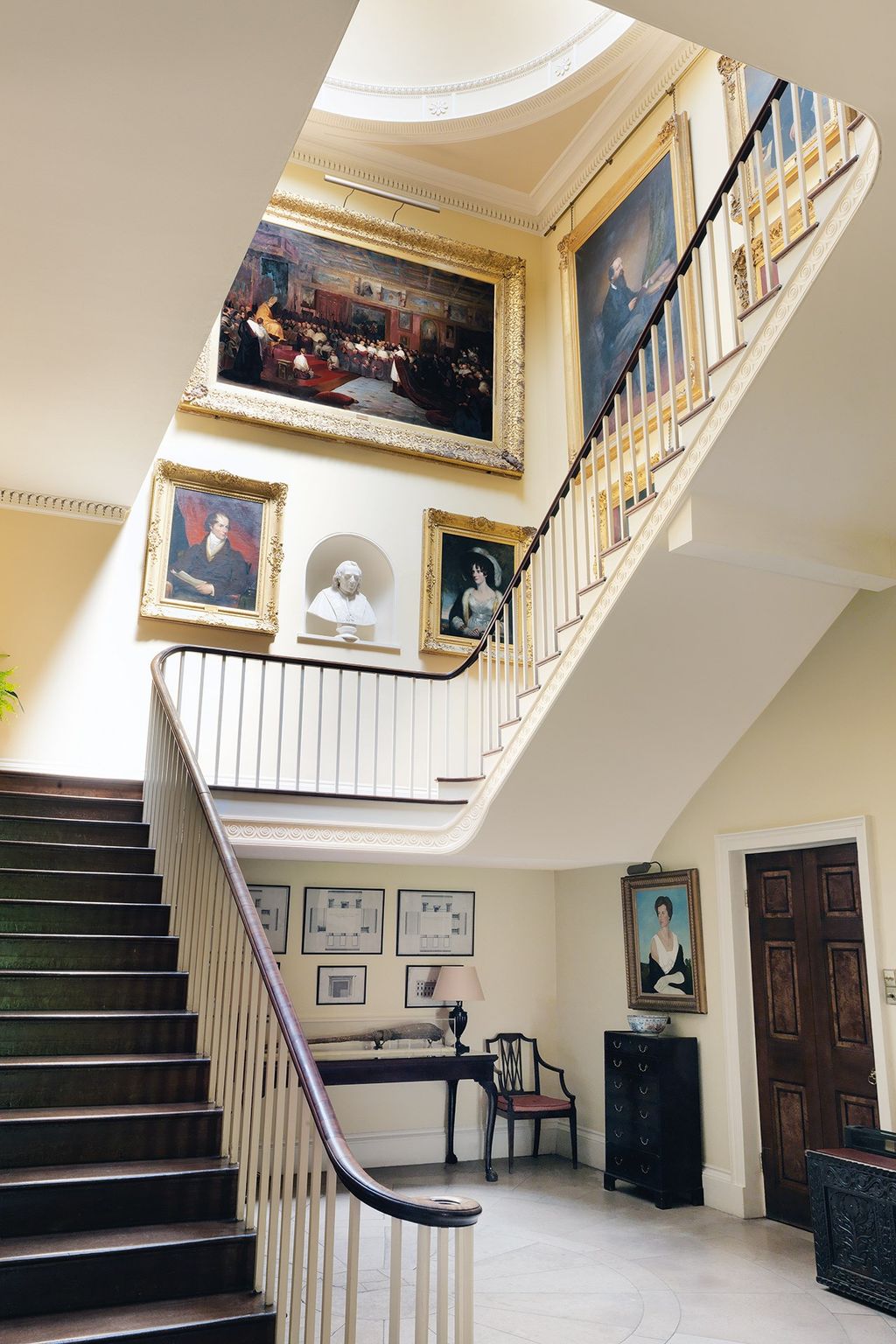 Image may contain Banister Handrail Furniture Chair Interior Design Indoors and Staircase