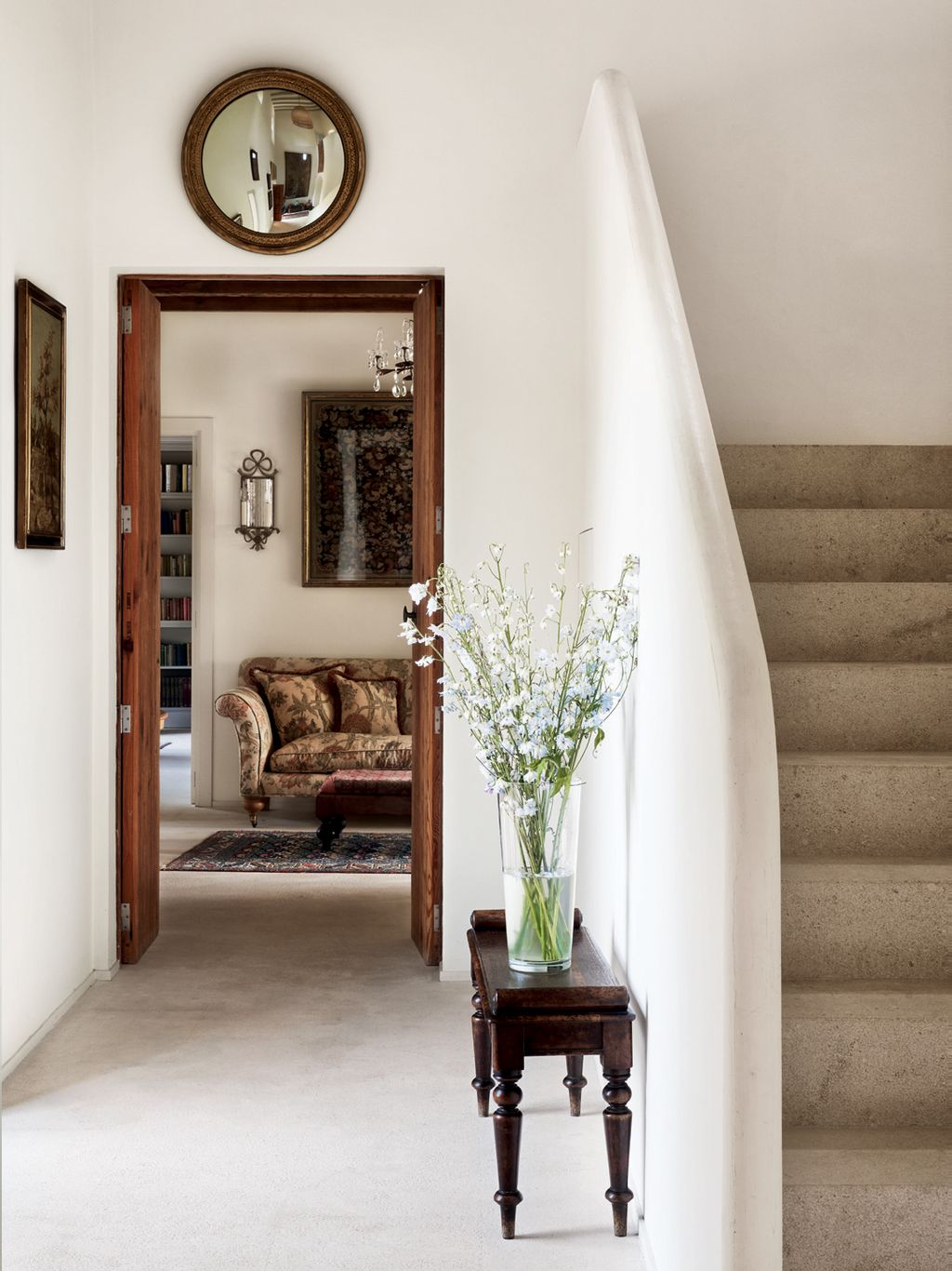 The hall leads into an anteroom that is now an annexe of the library beyond.