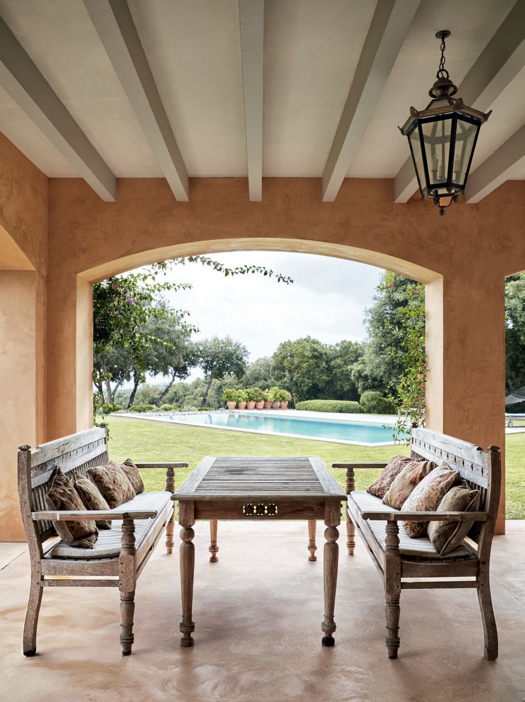 Image may contain Furniture Couch Table Chair Coffee Table Living Room Room and Indoors