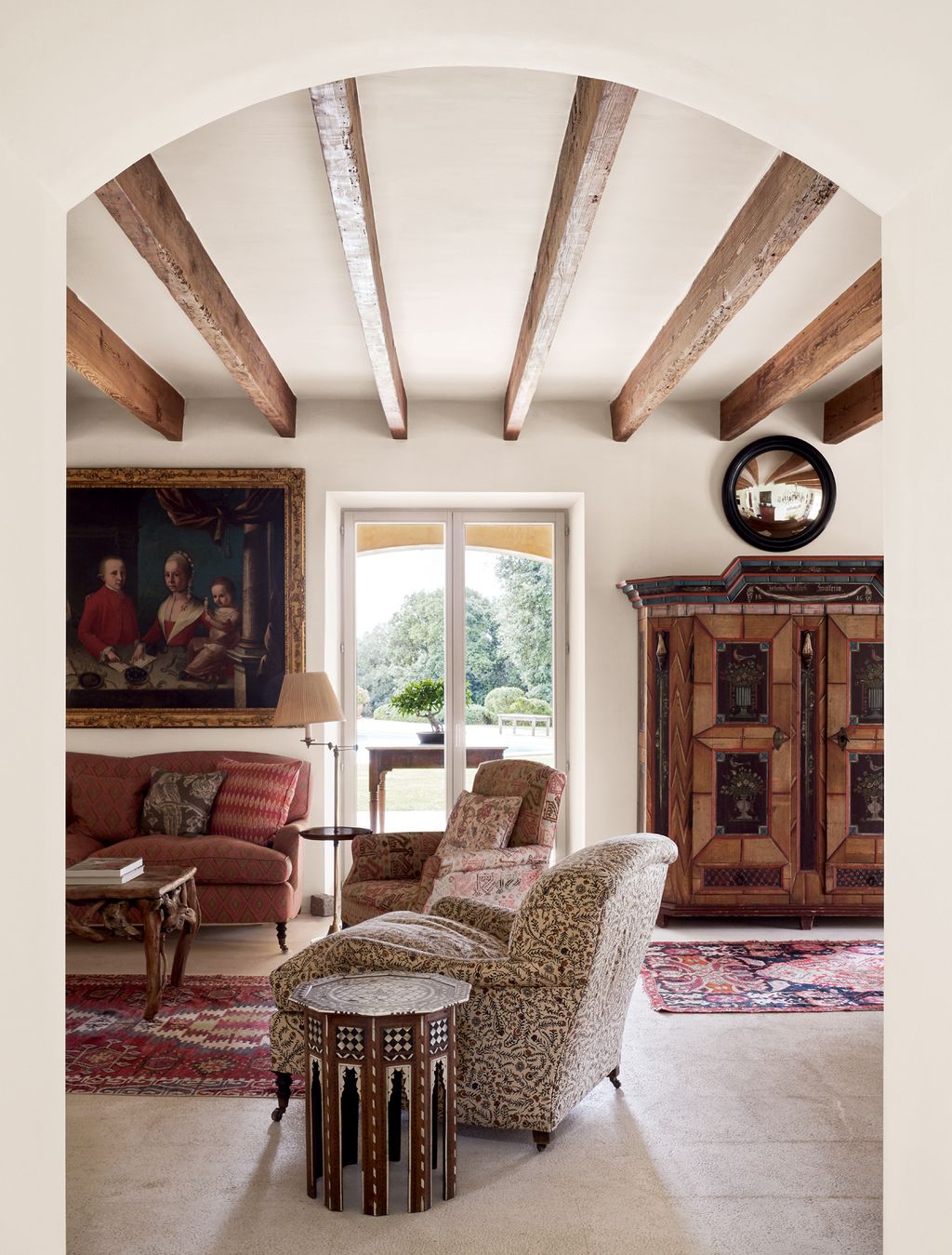 The Syrian motherofpearl inlaid table and Bavarian armoire add distinctive decorative detail.