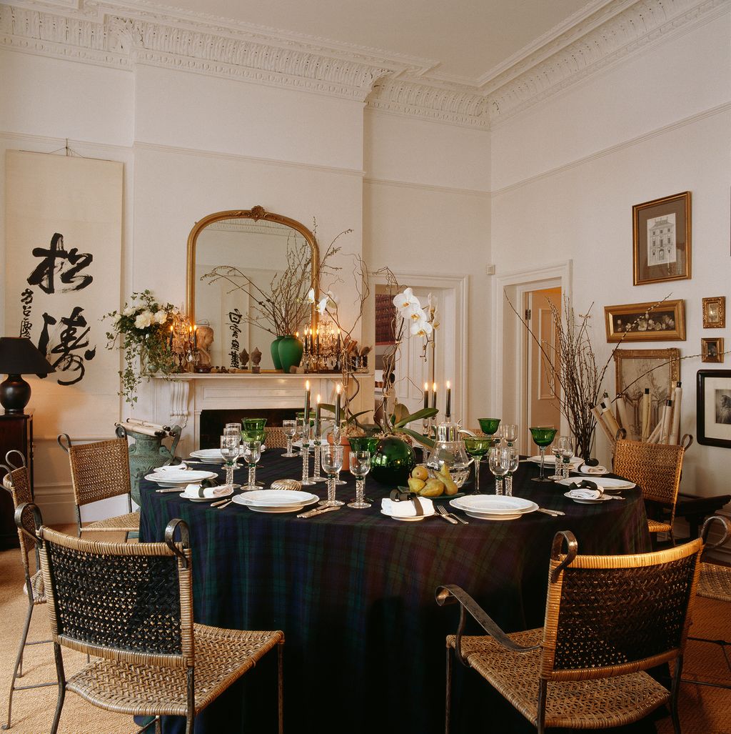 Image may contain Furniture Chair Indoors Room Interior Design Living Room Home Decor Dining Room and Plant