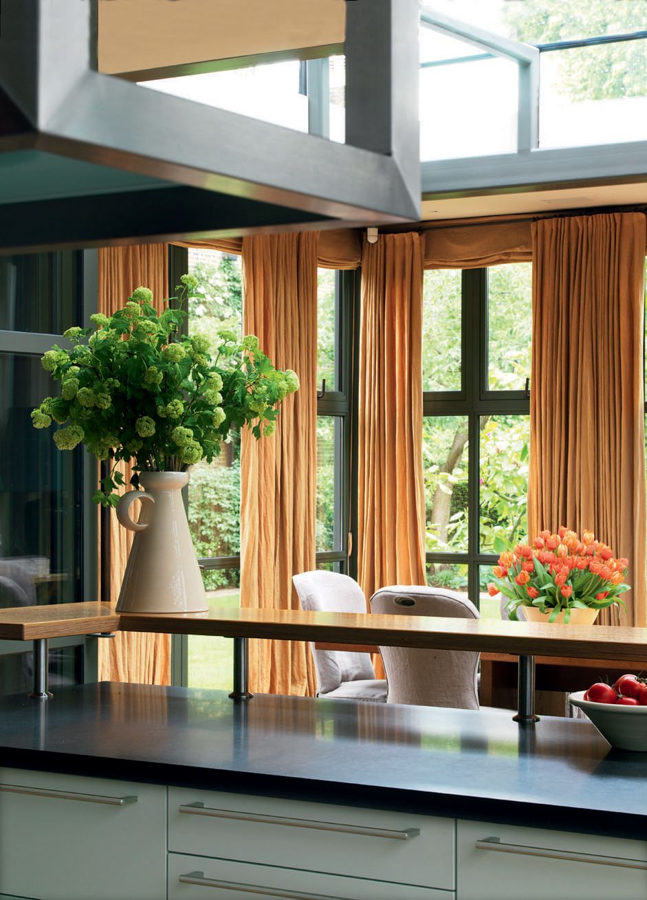 Image may contain Wood Interior Design Indoors Furniture Plant Tabletop Room Hardwood Flower and Blossom