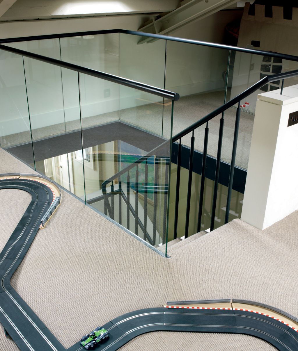 Image may contain Banister Handrail Staircase Interior Design Indoors and Railing