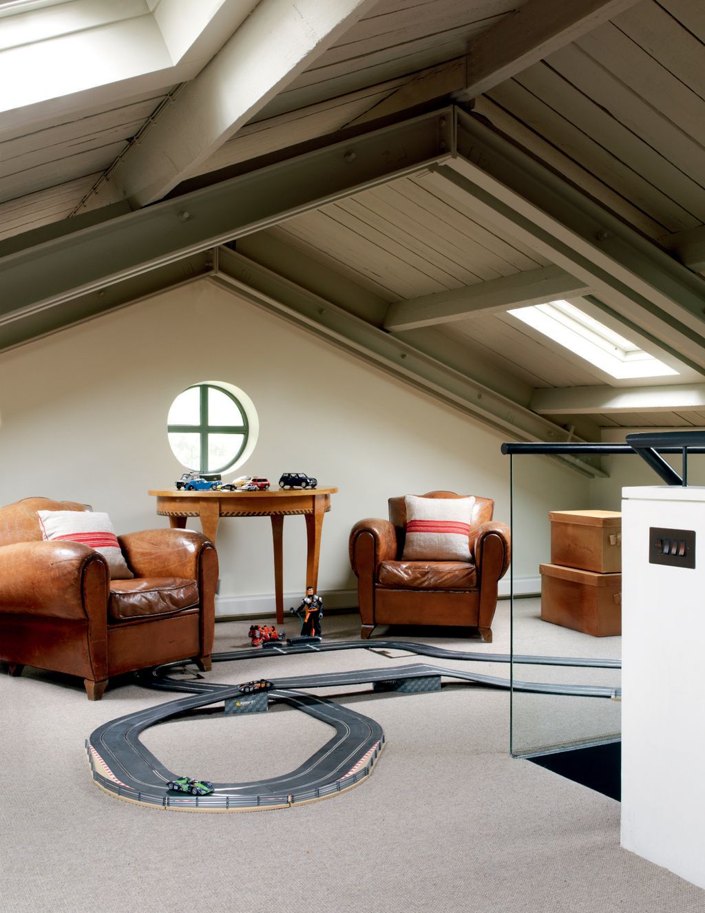 Image may contain Loft Building Housing Indoors Furniture Attic Living Room Room and Rug