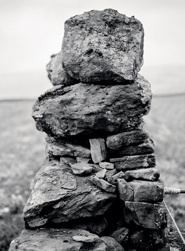 Image may contain Rock Rubble Slate Wedding Cake Food Cake and Dessert