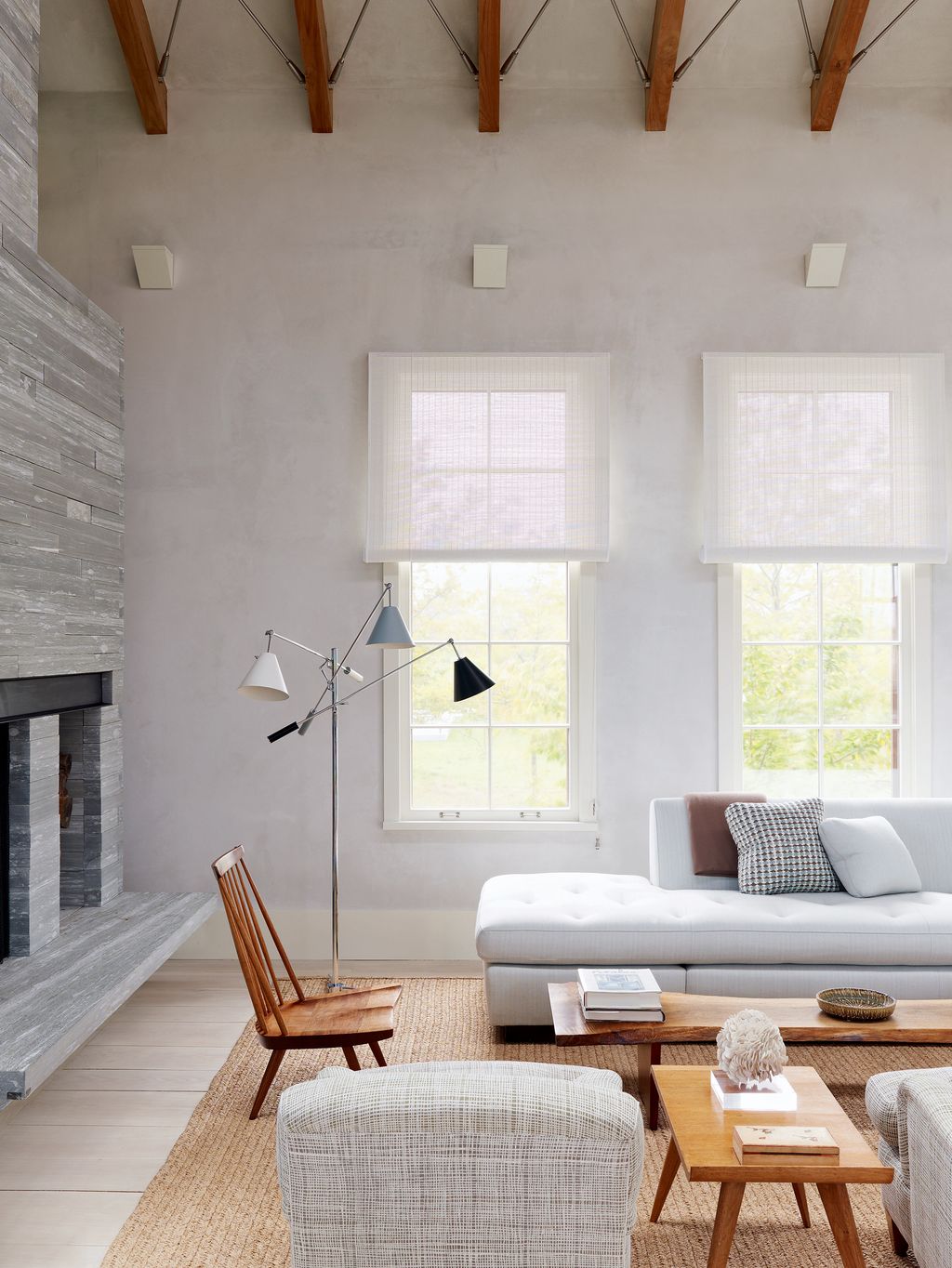 Image may contain Furniture Chair Table Coffee Table Rug Living Room Room and Indoors