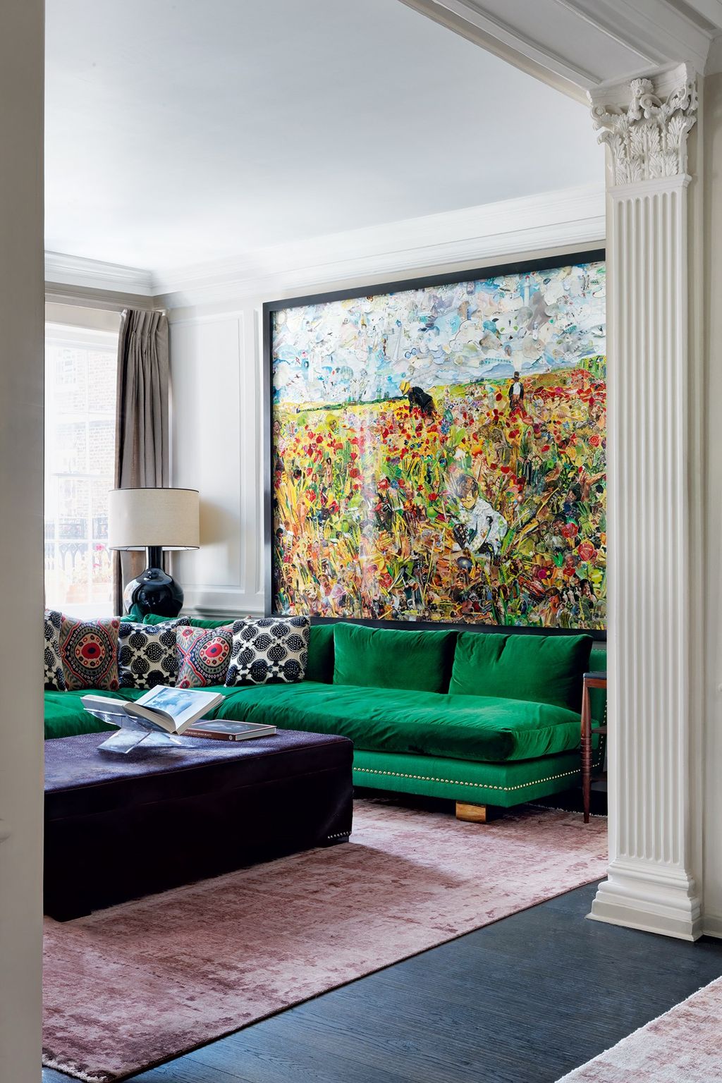 Image may contain Furniture Couch Living Room Indoors Room Rug Table Cushion and Coffee Table