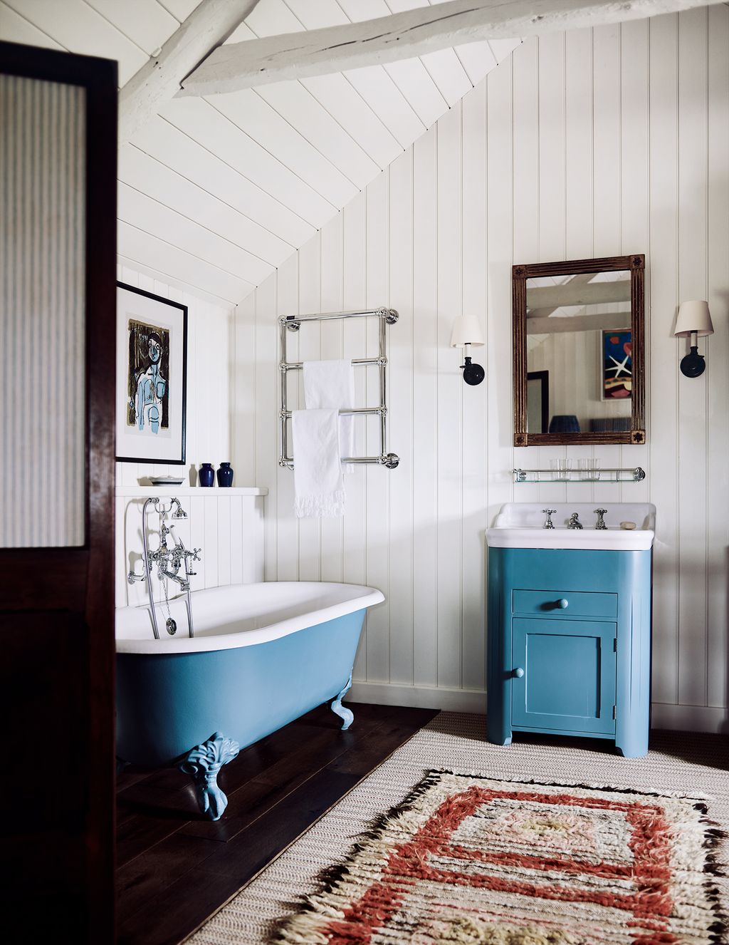Image may contain Indoors Room Rug Tub Bathtub Interior Design and Bathroom