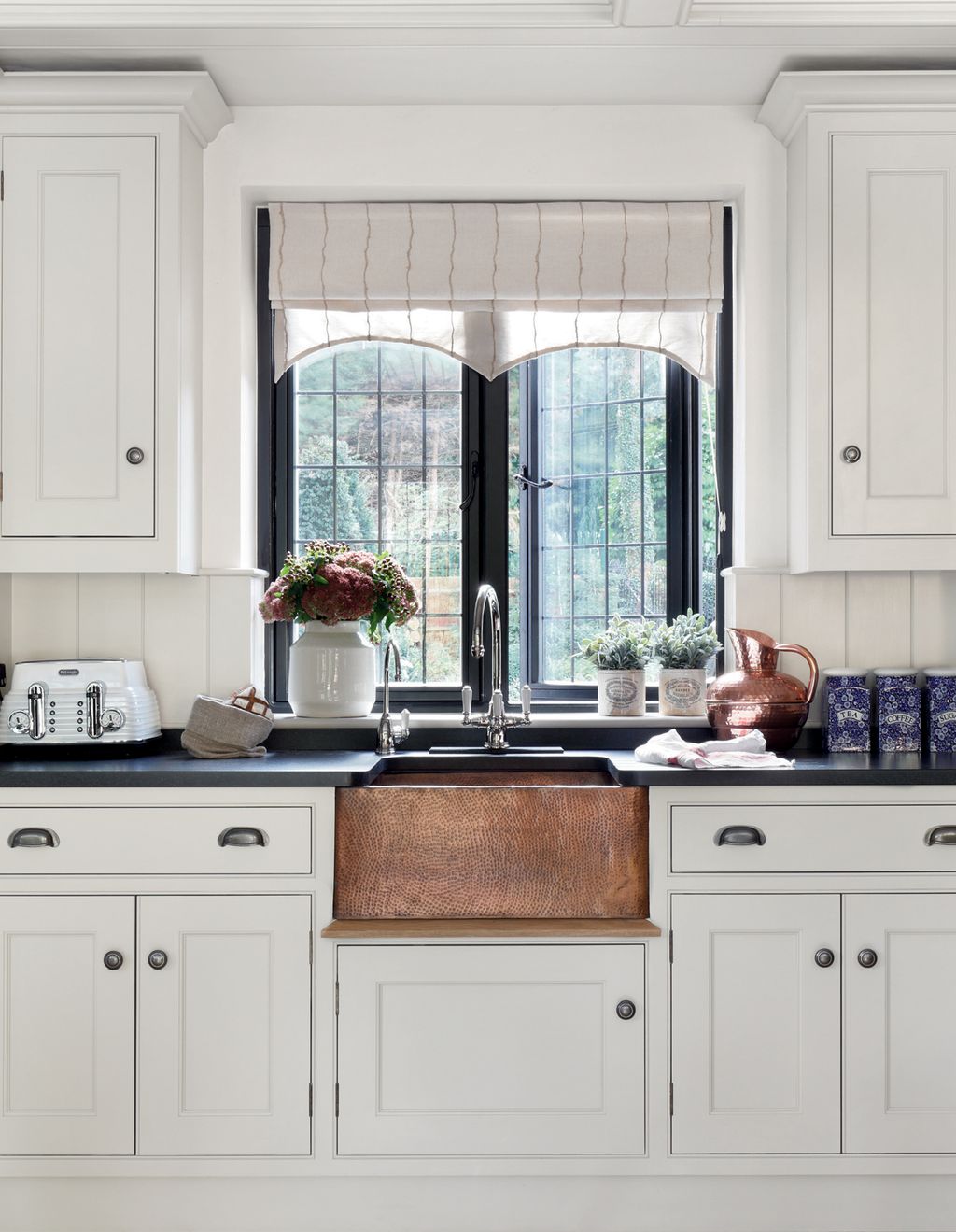 Image may contain Indoors Room Kitchen Sink Faucet and Furniture