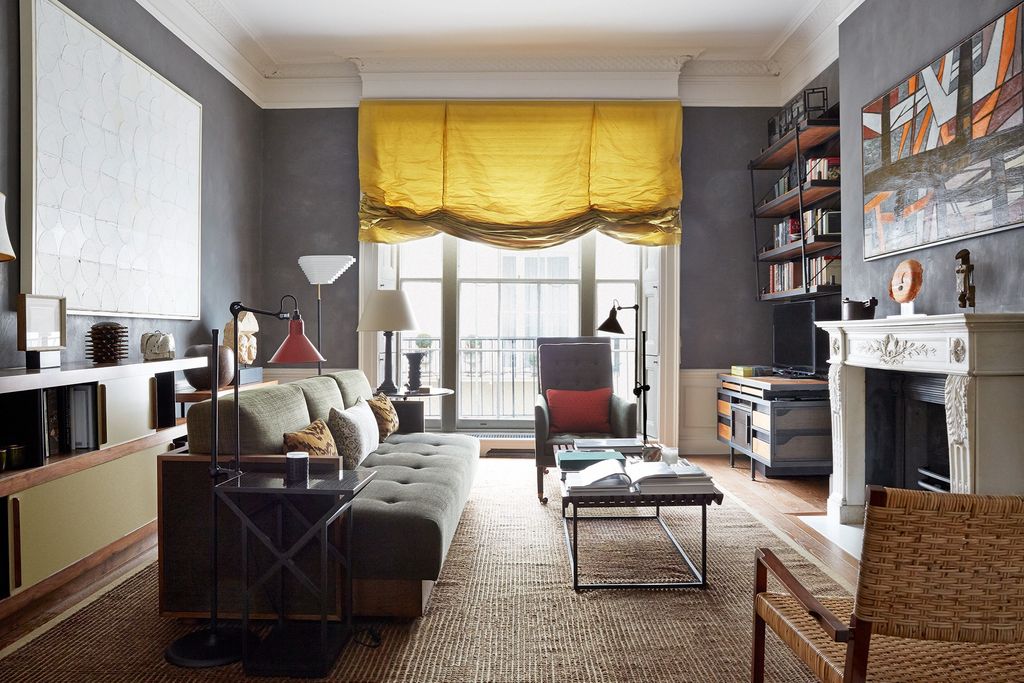 Image may contain Furniture Living Room Indoors Room Couch Table and Home Decor