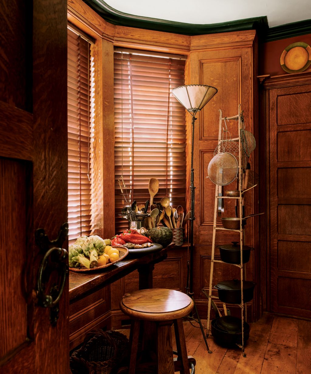 Image may contain Furniture Home Decor Wood Interior Design Indoors Bar Stool Hardwood and Room