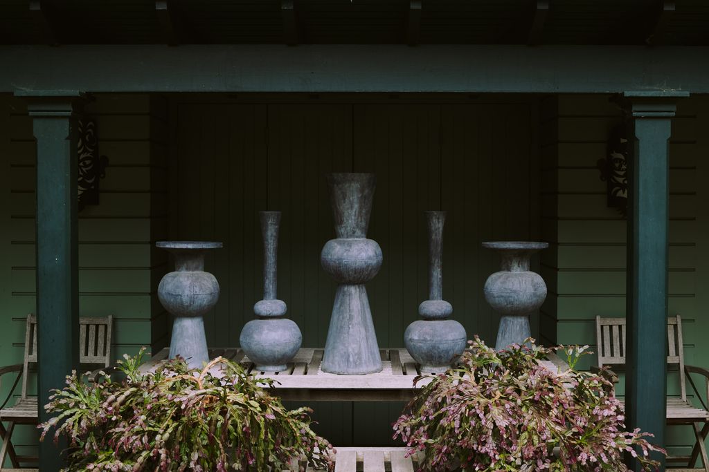 Image may contain Vase Pottery Jar Plant Potted Plant Flagstone and Planter