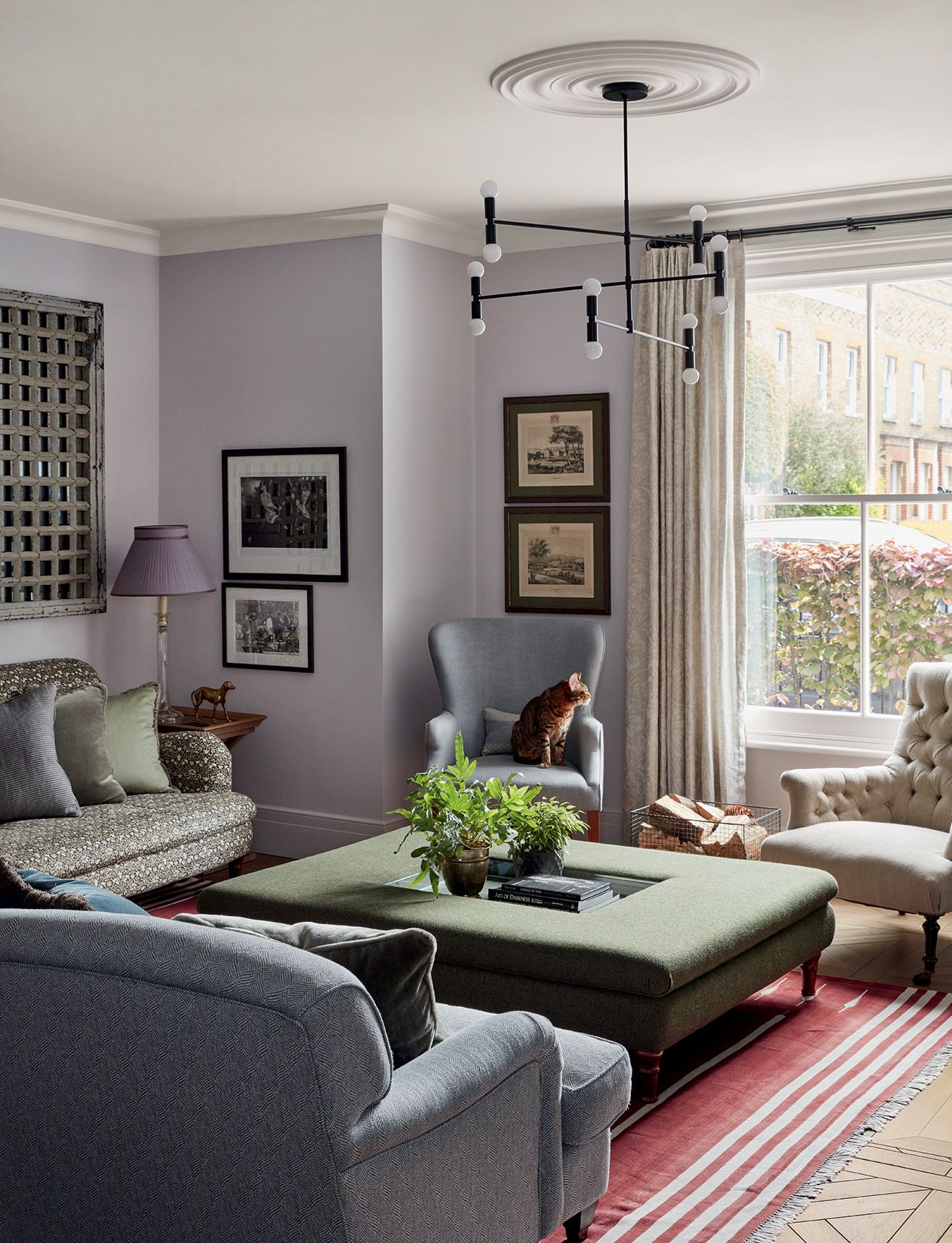 Image may contain Furniture Living Room Indoors Room and Couch