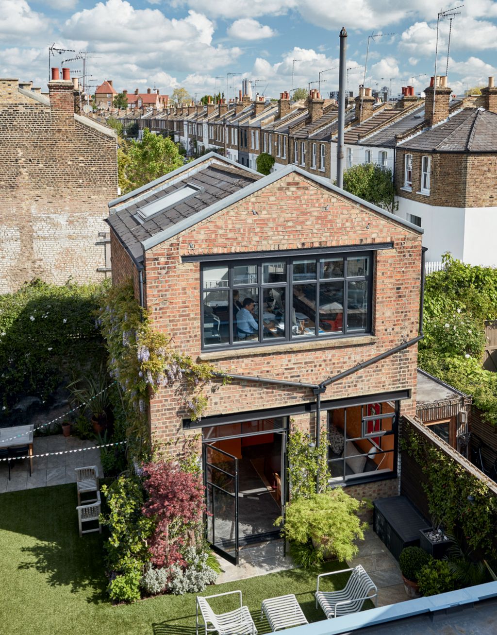 Image may contain Roof Human Person and Brick