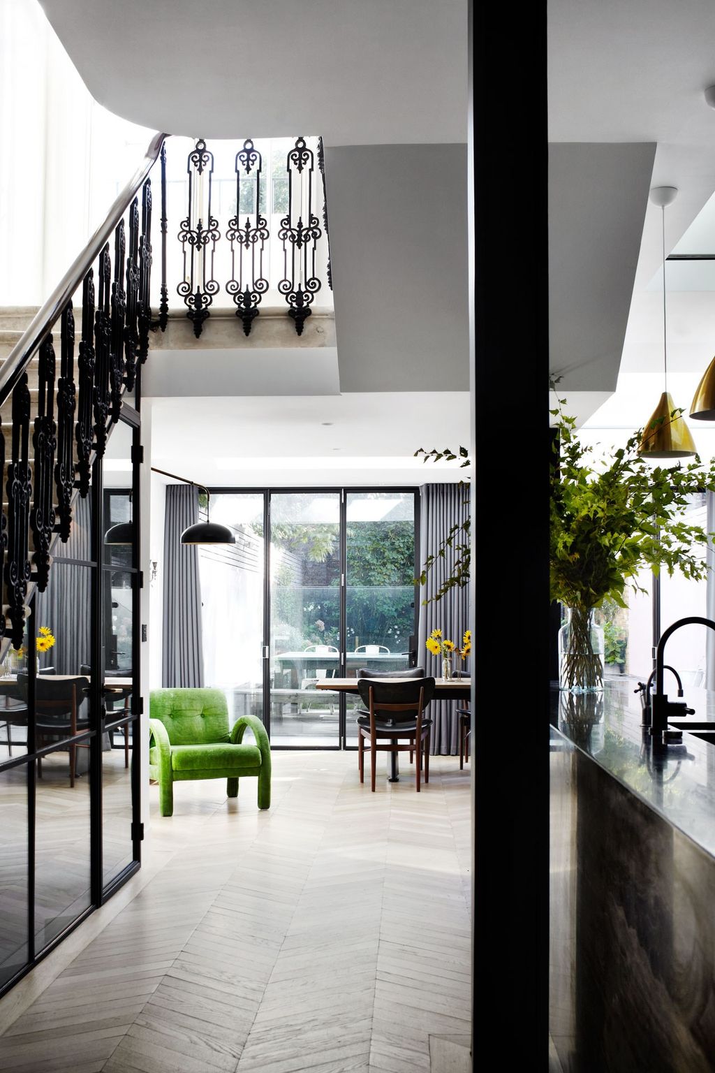 In this London townhouse designed by Suzy Hoodless the interior designer has added glass fronted Crittal doors to the...