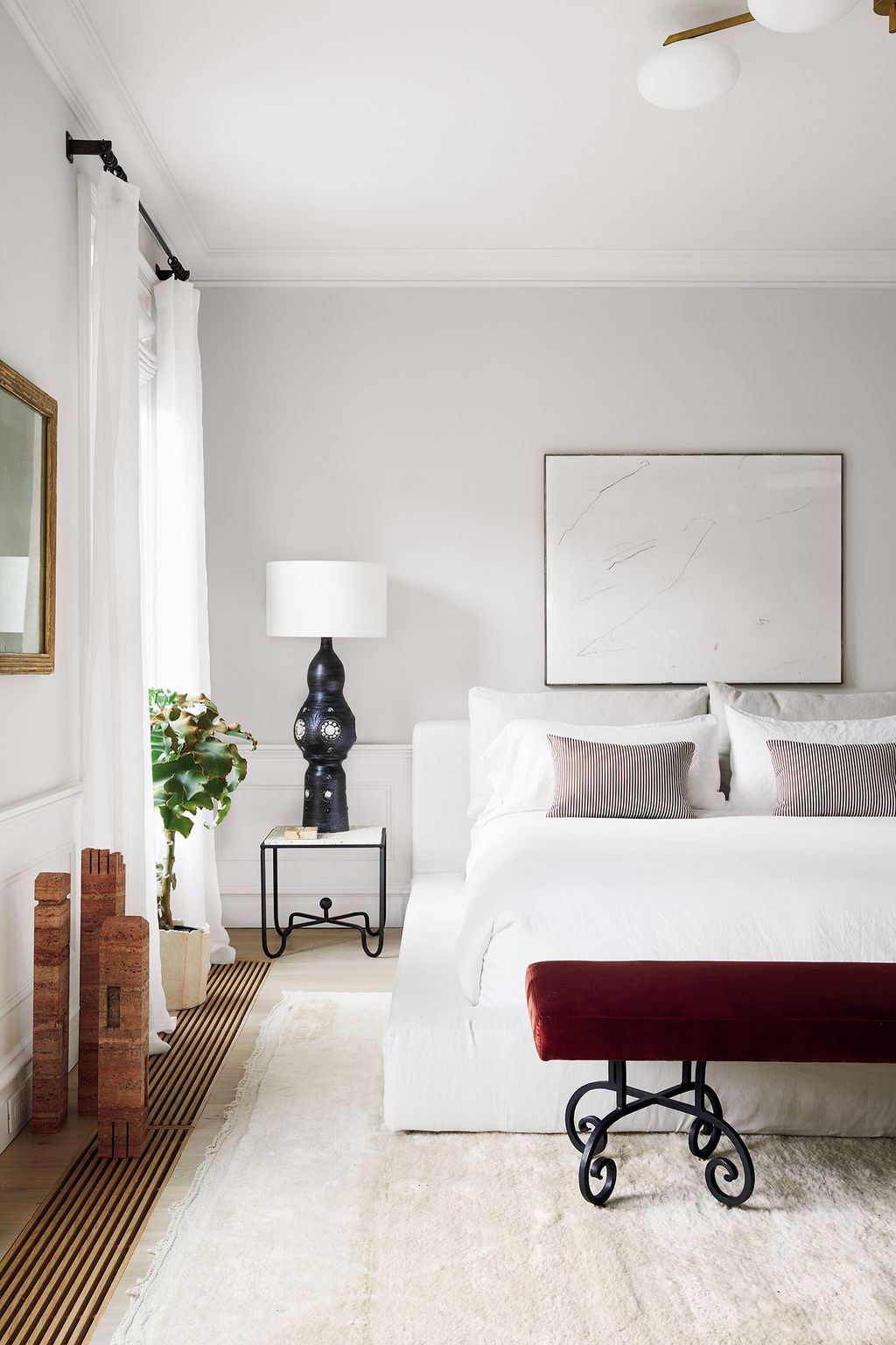 Image may contain Room Bedroom Indoors Furniture Bed Dorm Room and Interior Design