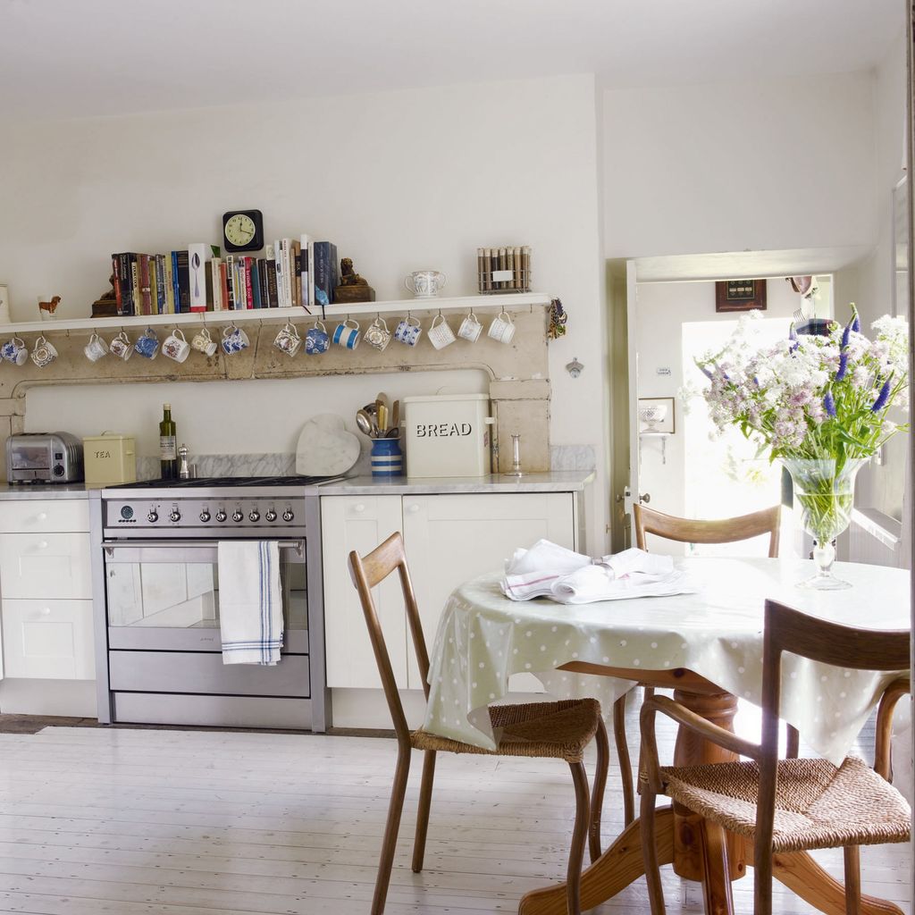 Image may contain Furniture Chair Room Indoors Wood Flooring Kitchen Interior Design and Hardwood