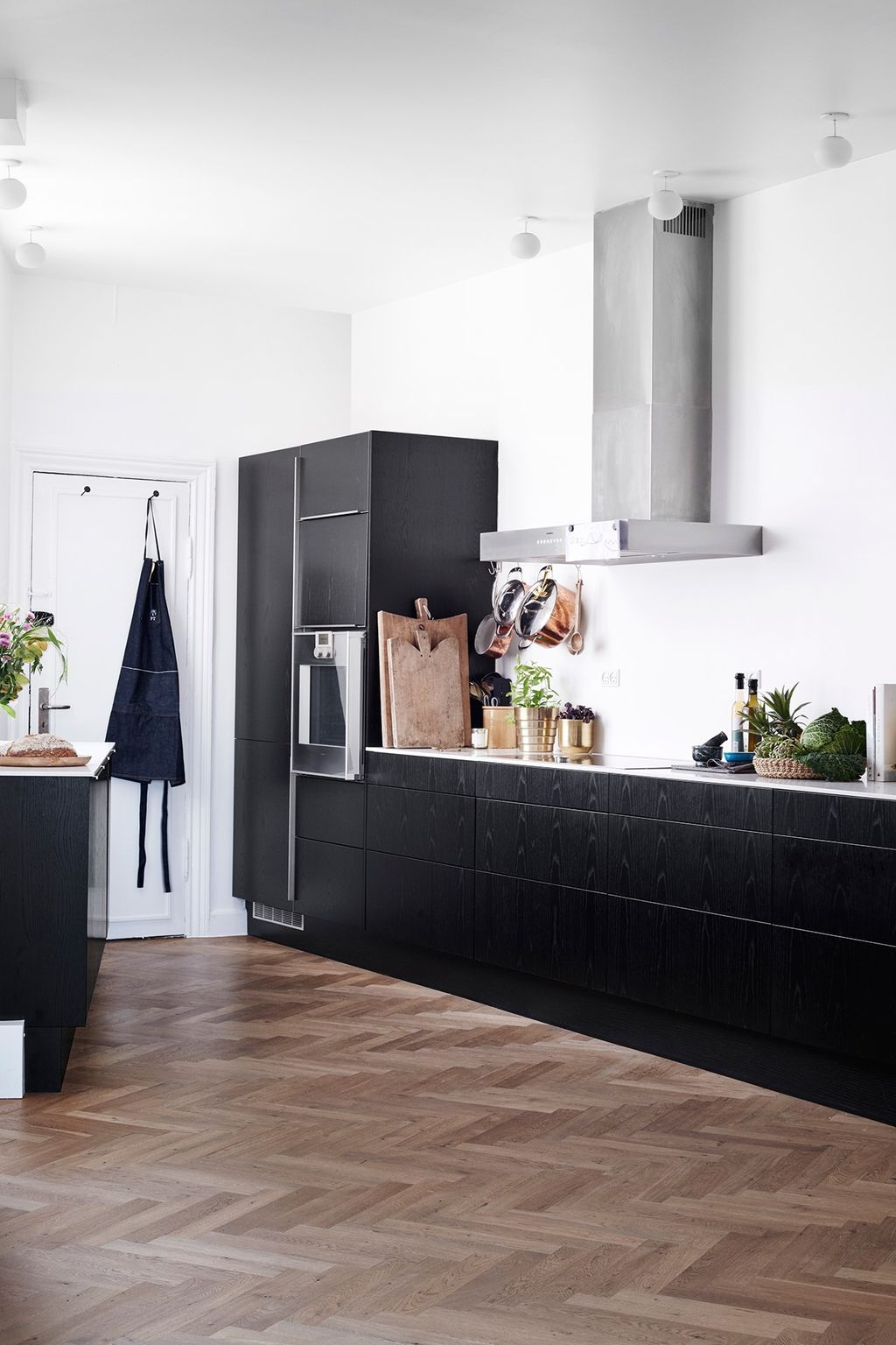 Image may contain Interior Design Indoors Furniture Room Flooring Sideboard Living Room and Wood