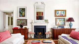 Image may contain Living Room Room Indoors Bedroom Furniture Cushion Pillow Interior Design Couch and Fireplace