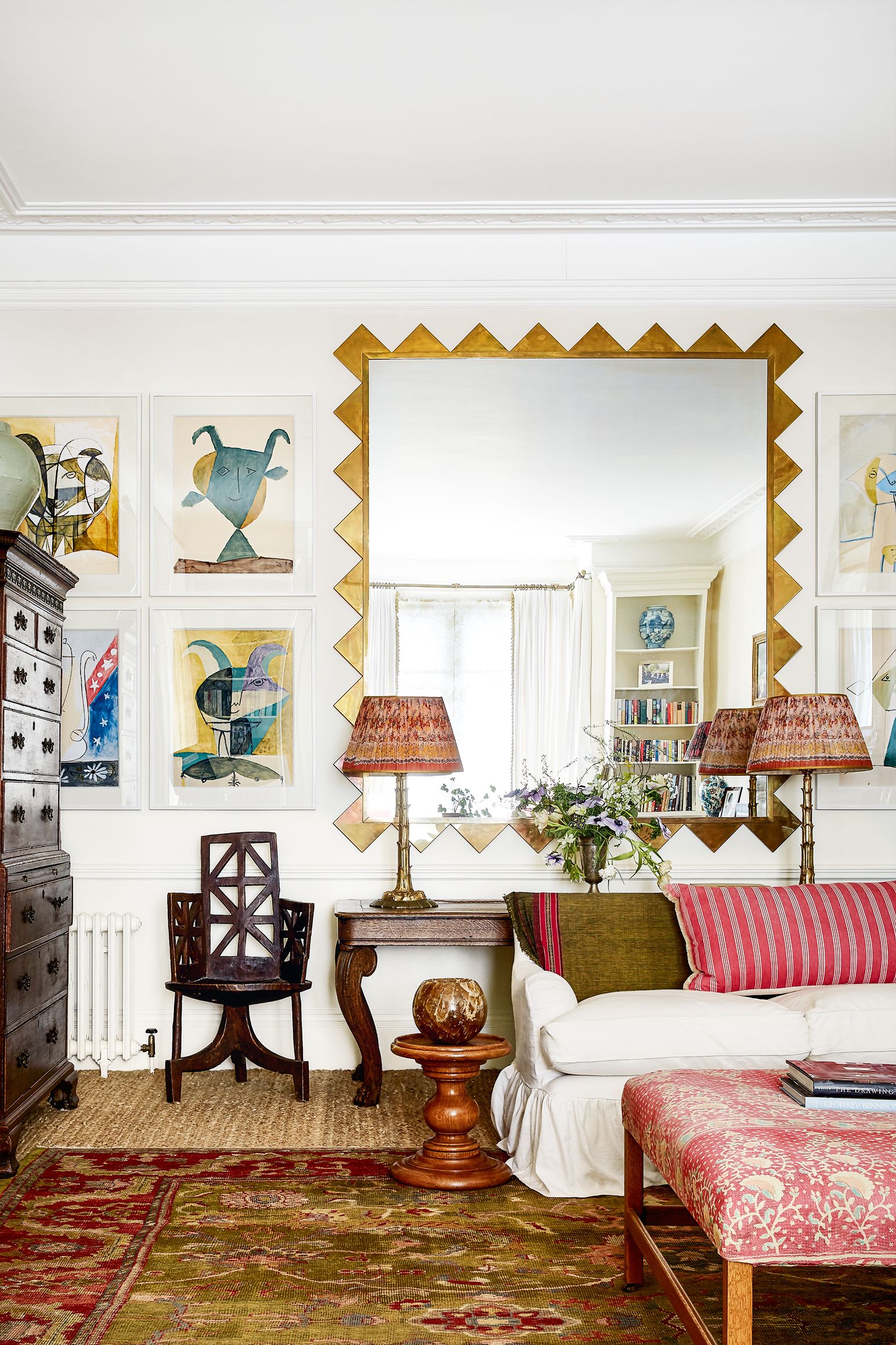 Image may contain Living Room Room Indoors Furniture Cushion Interior Design Couch Pillow Bedroom and Rug