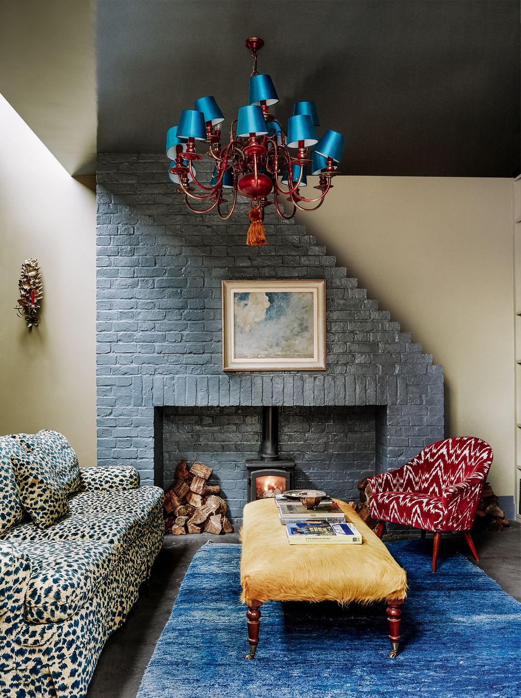 Image may contain Furniture Living Room Room Indoors Interior Design Couch and Rug