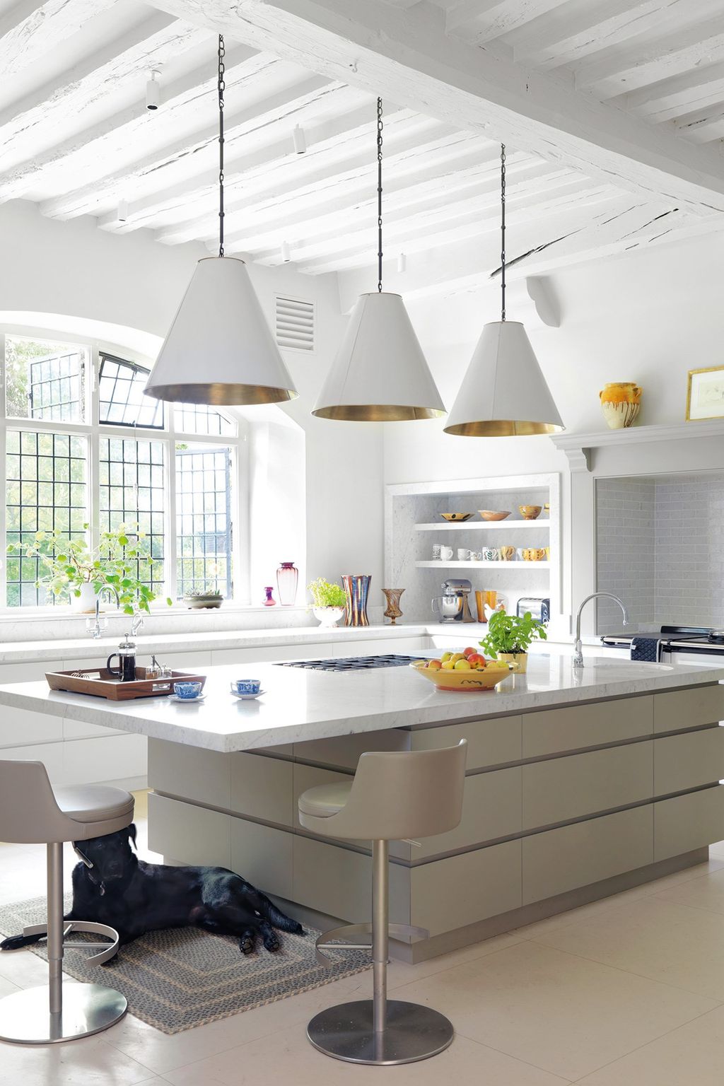 Image may contain Indoors Room Kitchen Kitchen Island and Interior Design