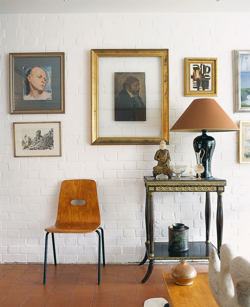 Image may contain Furniture Chair Human Person Lamp and Table Lamp