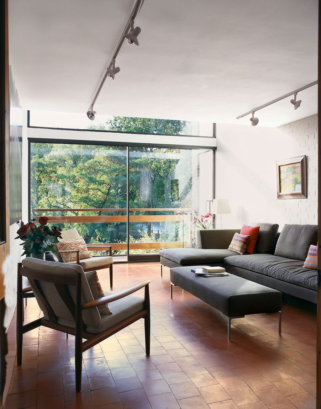 Image may contain Furniture Living Room Room Indoors Couch Housing Building Interior Design Table and Chair