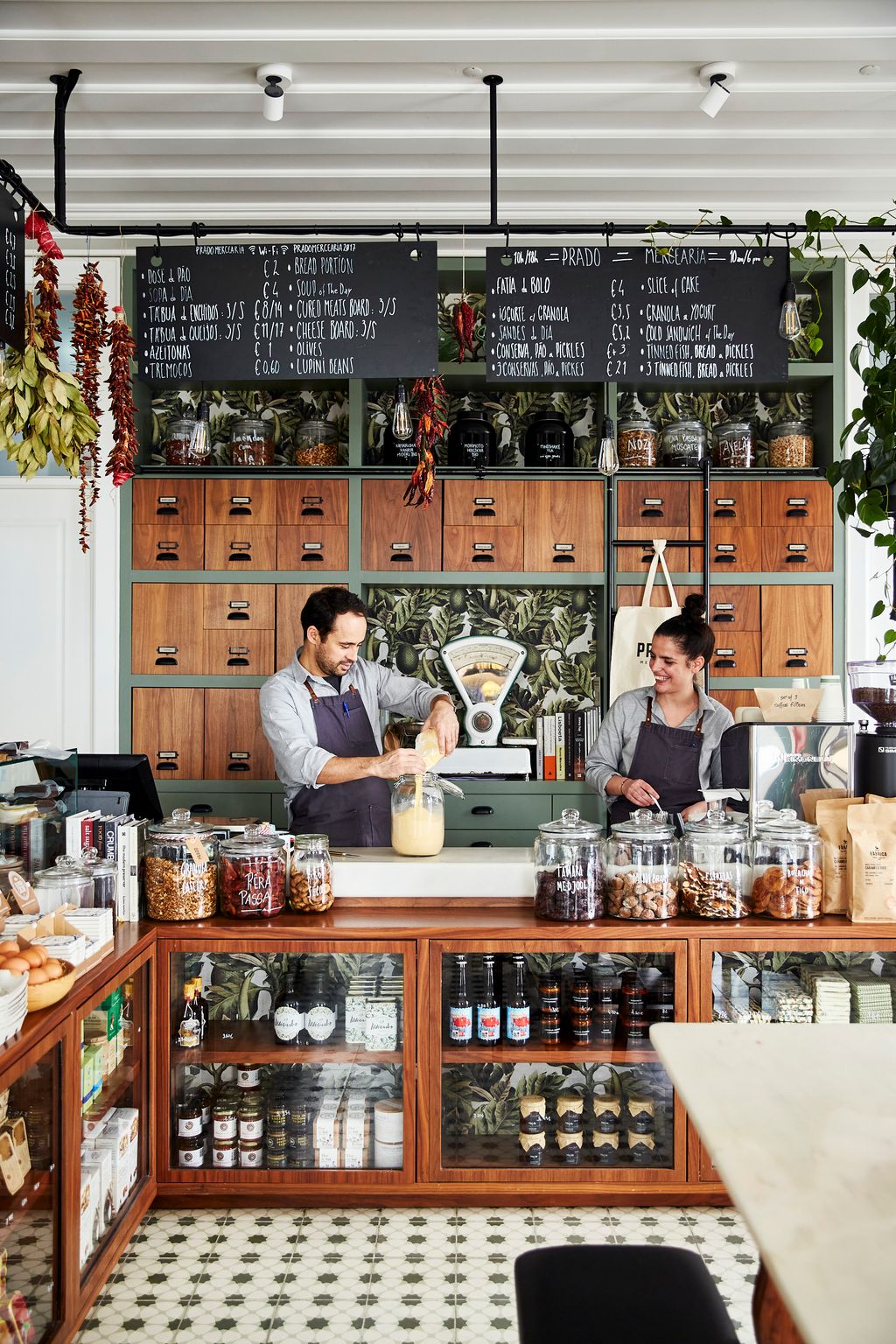 Image may contain Shelf Human Person Shop Restaurant Cafe and Pantry