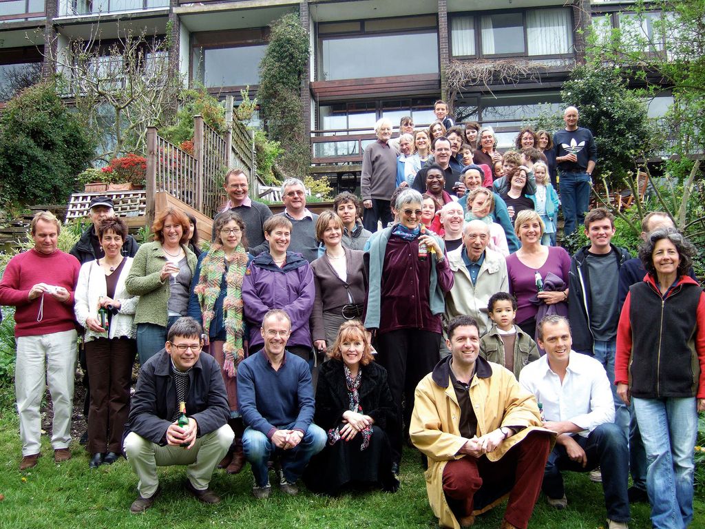 Image may contain Human Person Pants Clothing Denim Jeans Apparel Crowd Grass Plant Audience and Tina Howe