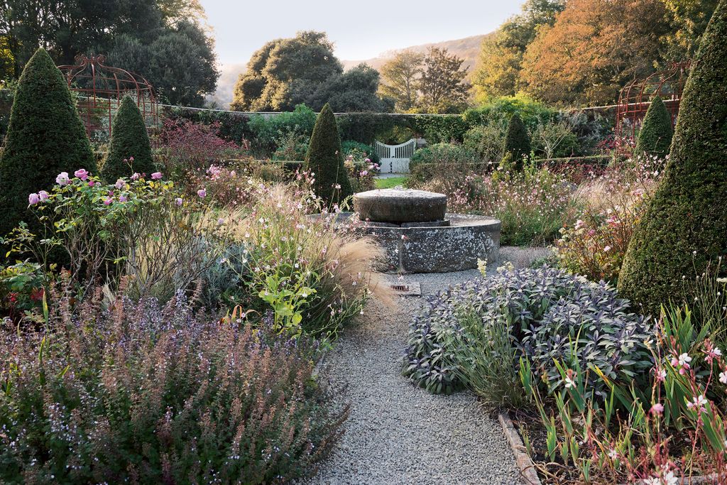 Image may contain Garden Outdoors Plant and Arbour