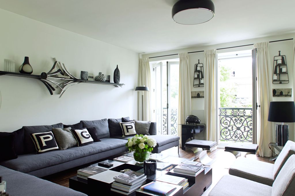 Image may contain Furniture Living Room Indoors Room Couch Table Coffee Table and Interior Design